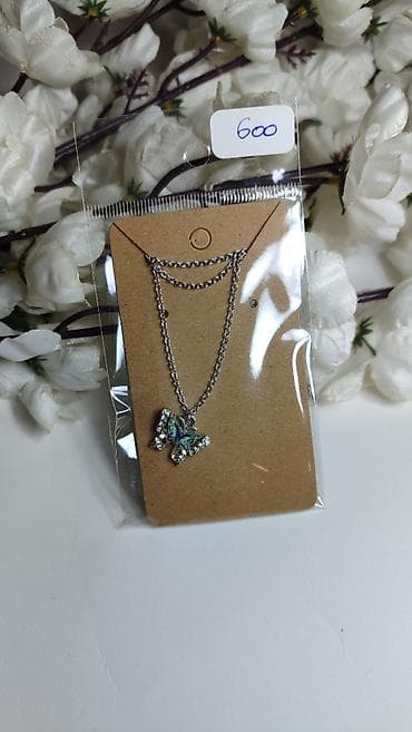 rajf za bebe: Ogrlica sa priveskom leptira - Tanak lančić u srebrnom tonu - — 5