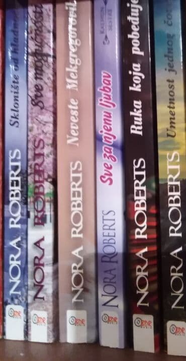 elektricni tricikl novi sad: Nora roberts 13 knjiga. Novi!! Komplet 2800. Kom 250 — 2