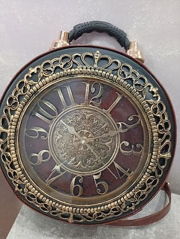 vogue naocare za vid: Nova torba funkcionise i kao pravi sat,prikazano je na fotografiji — 1