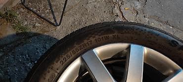 osovina auto: Komplet od 4 aluminijumske felne sa gumama za Volkswagen. - Model — 5