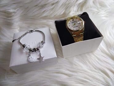 Sat i narukvica, dobija se u kutiji
Cena 3100 din