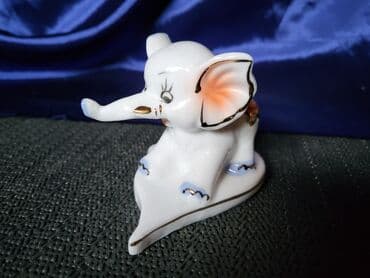 Porcelanska nova,vintaz figura slonce. Figura mereni najistureniji