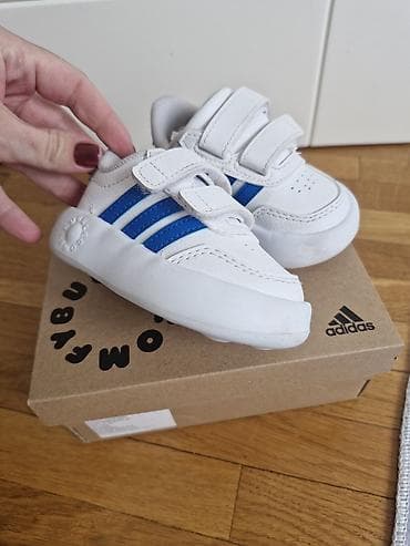 Dečije patike Adidas – bele sa plavim prugama - Model: Adidas — 3