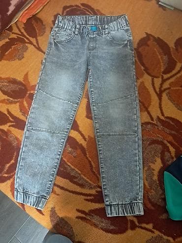 Dečije farmerke – sivi isprani džins - Model: uske nogavice sa blagim