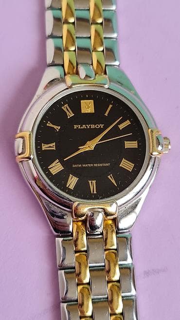 versus versace satovi: Playboy ručni sat – model 6360 - Kućište okruglo, dvoetoni dizajn — 1