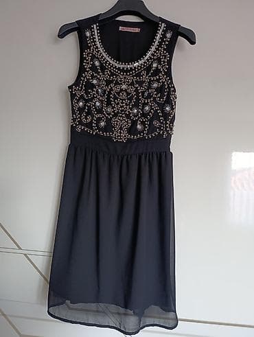 Crna haljina brenda Maia Henera, veličine S. Gornji deo haljine je