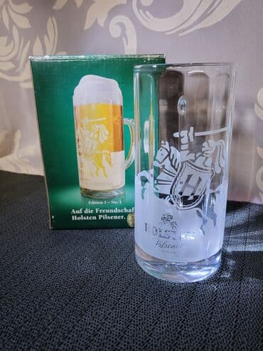 jelen pivo krigla: Nova krigla,vintaz Holsten Pilsner. Krigla nova,sve na njoj odsjaj od — 1