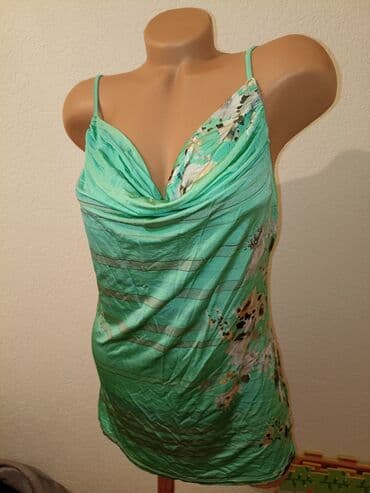 triple s: Majica je lagana kao pero,bas je prijatna za nosenje.Velicina L — 2