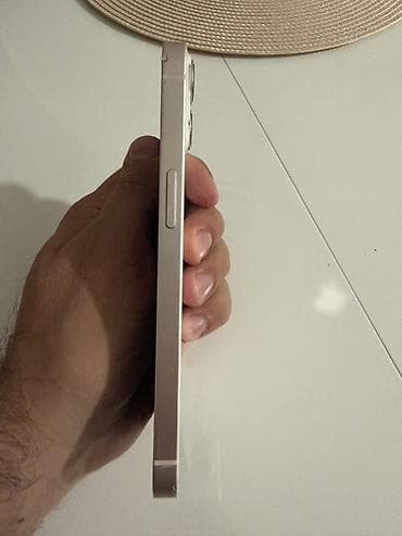 za igru: * iPhone 13 128 GB * Bela boja (White) * Battery Health: 75% * SIM — 5