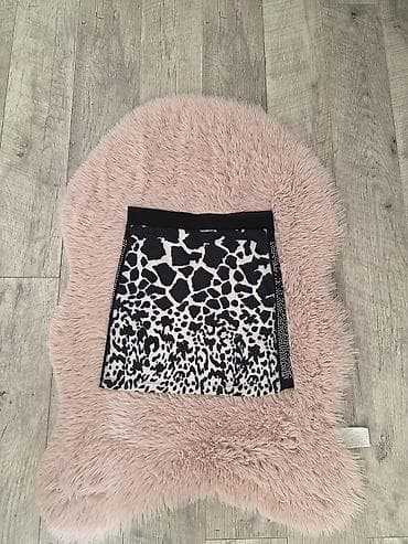 Suknjica crno bela. -Dizajn: crno-beli animal print sa efektom