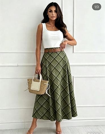 novogodisnje suknje: ✅Ženska midi suknja na A-kroj sa kariranim dezenom
✅2400 din 
S M L — 4