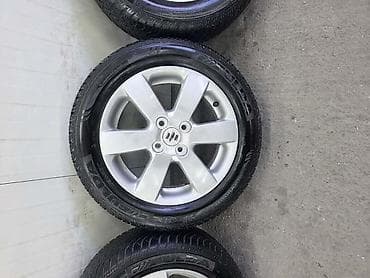 din 2950: ALUMINIJUMSKE FELNE SWIF SPLASH IGNIS 15 4 X 100 | ORIGINAL SUZUKI — 4