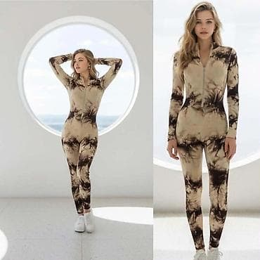 Ženski jednodelni kombinezon sa printom tie-dye. - Model: uski kroj