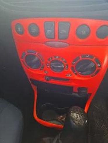 cerade za auto: FIAT PUNTO PANEL I KONZOLA KOMPLET CRVENI | Ide u kompletu prekidaci — 1