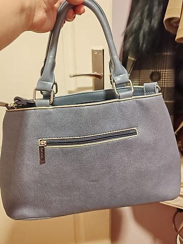Ženska torba DOCA, svetloplava - Materijal: veštačka koža sa finom