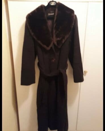 Ponchos: Nov. vuna 70%. 44 — 1