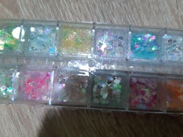 Nega noktiju: Mix set 12u1 za ukrasavanje nokta
Cena 350din — 3