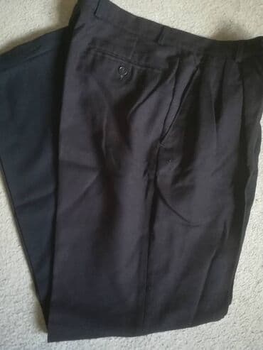 donji deo pidzame muski: Pantalone crne "Nicola*s" vel 104/46. Obim struka 72 cm, obim bokova — 7