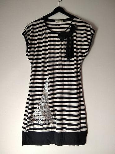 Majica vel.L u super stanju.Može biti i tunika ili kratka haljinica