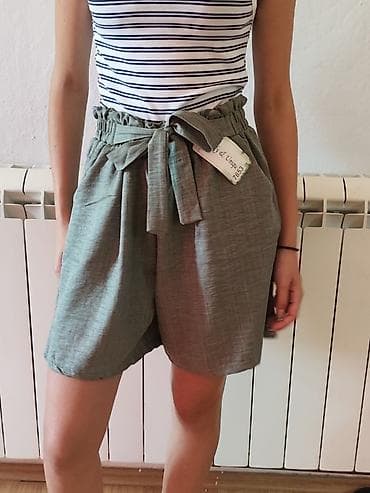 Ženske bermude sa visokim strukom i pojasom na vezivanje. - Boja na lalafo.rs Ženske bermude sa visokim strukom i pojasom na vezivanje. - Boja