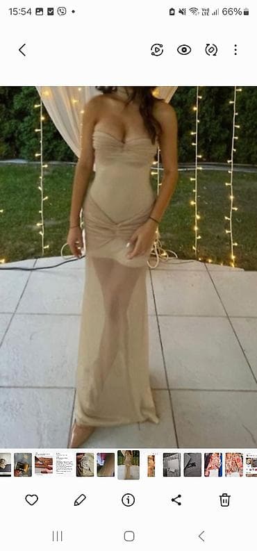 Haljine: Elegantna duga haljina u nijansi šampanj/bele kafe. Model je uski i — 1