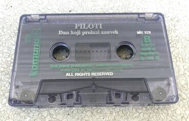 dva i po muškarca sa prevodom: Audio kaseta Piloti - Dan koji prolazi zauvek Piloti - Dan koji — 4