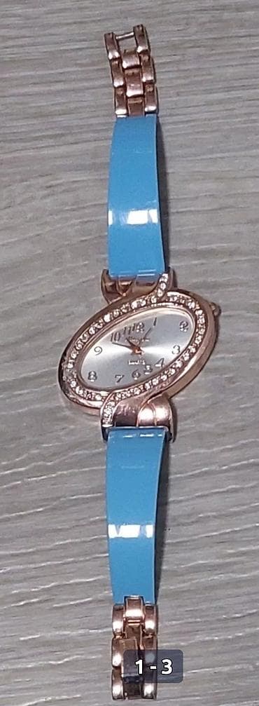 Personal Items: Ženski ručni sat sa elipsastim kućištem u boji roze zlata i ukrasnim — 1