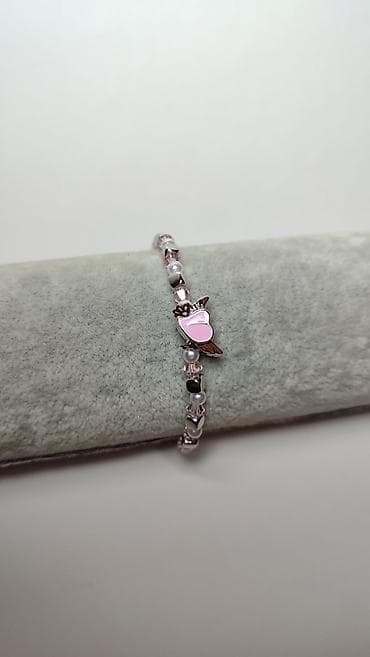 torbe za plazu ps: Nježna narukvica sa privjeskom u obliku srca sa krilima u roze boji — 4