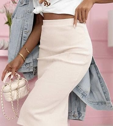 Suknja dubok struk sa elasticnim pojasem ispod kolena. Rebrasti pamuk