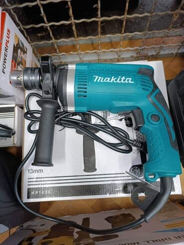 polovni elektricni alati: 710W - 13mm - HP1630 Cena 4200 din Udarna buslica Snaga: 710 W — 1