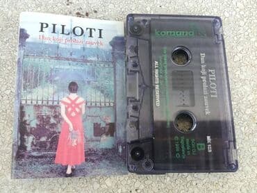 dva i po muškarca sa prevodom: Audio kaseta Piloti - Dan koji prolazi zauvek Piloti - Dan koji — 2