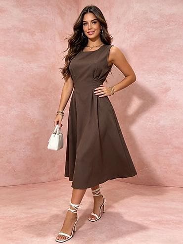 Haljine: ✅Elegantna midi haljina bez rukava
✅2400 din — 1