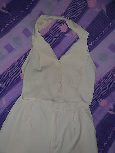 Kompleti: Damski komplet – prsluk i pantalone, bež/šampanj ton. - Materijal — 7