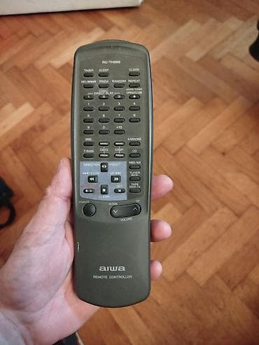 Auto elektronika: Daljinski za Aiwa Aiwu radio liniju.Ispravan.Koristi deblje — 1
