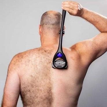 philips kafe aparat: Brijač za leđa Cena: 2200 din Ergonomski dizajn: Ima dugačku ručku — 4