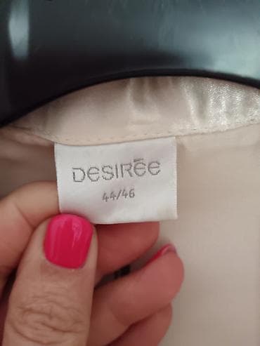 kupaci l: Ogrtac zenana veličina 44/46. Svetla krem osnova sa sitnim printom — 2