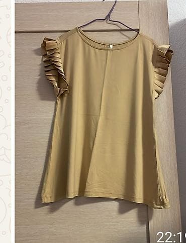 Ženska majica/bluza bez rukava u bež/karamel nijansi. Okrugli izrez