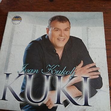 akustična bas gitara: Muzicki CD – Ivan Kukolj Kuki - Izdavač: Grand Production (logo na — 1