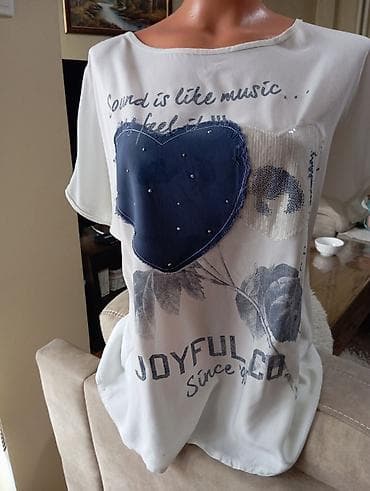 Ženska bluza Sorgaro Women, veličina L.Poluobim 56cm,duzina 65cm. -