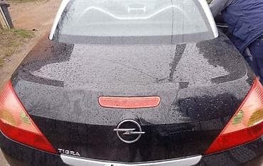 tepih crni: GEPEK VRATA ZA OPEL TIGRA | Svi delovi za Opel vozila : Astra G H J  — 1