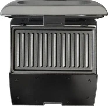 ručni masažer: Tehnički detalji Opšte Vrsta aparata: Mini gril Materijal ploča — 9