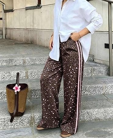 Pantalone: 🔥Ženske široke pantalone sa animal printom i bočnim prugama
✅2400 din — 1