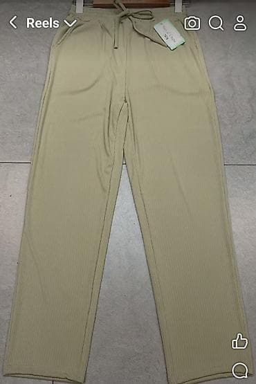 top s perjem: Pantalone sa dzepivima i elasricnim pojasem na redice.Puder — 3