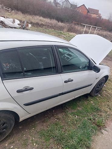 Prodaja automobila: Renault Mégane II, bele boje, hečbek sa 5 vrata. Pogonsko rešenje sa — 9