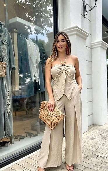 svecane haljine bele: Komplet top bez bretela i široke pantalone. - Kroj: strapless top sa — 2