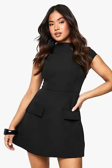 💫Crna mini haljina – elegantan A-kroj
✅1800 din