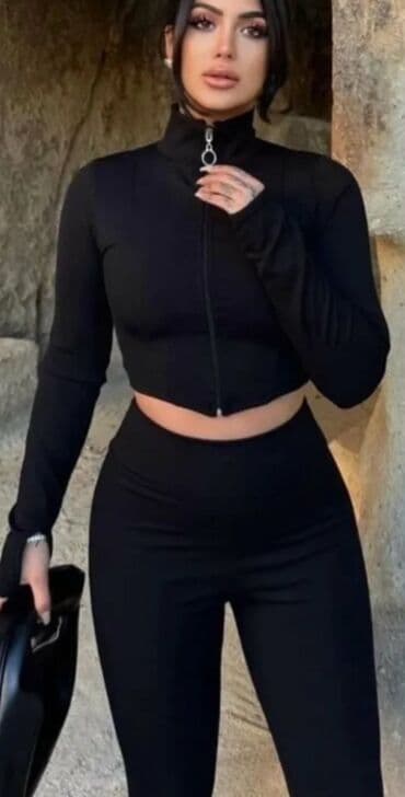 Dva dela – ženski sportski komplet u crnoj boji - Gornji deo: kratka na lalafo.rs Dva dela – ženski sportski komplet u crnoj boji - Gornji deo: kratka