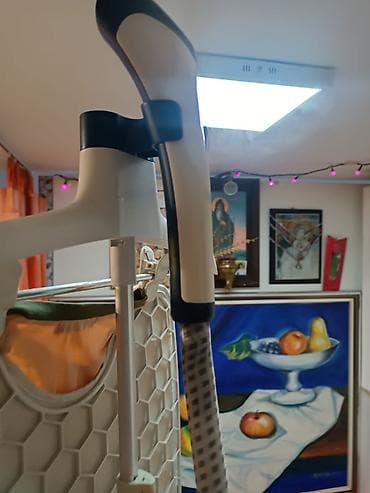Vertikalne pegle na paru: Parni aparat za osvežavanje i peglanje odeće na stalku – Philips - na lalafo.rs — 8 Vertikalne pegle na paru: Parni aparat za osvežavanje i peglanje odeće na stalku – Philips - — 8