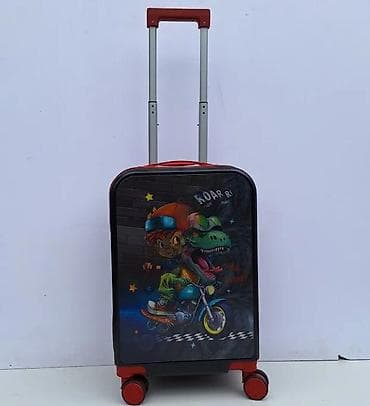 Backpacks, bags and suitcases: Dečji kofer na točkiće – motiv dinosaurusa na motoru - Tvrdo kućište at lalafo.rs — 1 Backpacks, bags and suitcases: Dečji kofer na točkiće – motiv dinosaurusa na motoru - Tvrdo kućište — 1