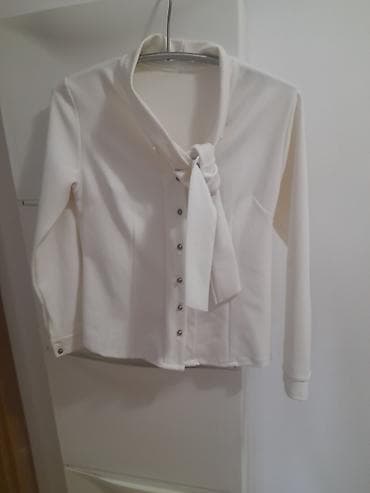 Elegantna ženska bluza u boji slonovače (krem/bela), dugih rukava, sa na lalafo.rs Elegantna ženska bluza u boji slonovače (krem/bela), dugih rukava, sa